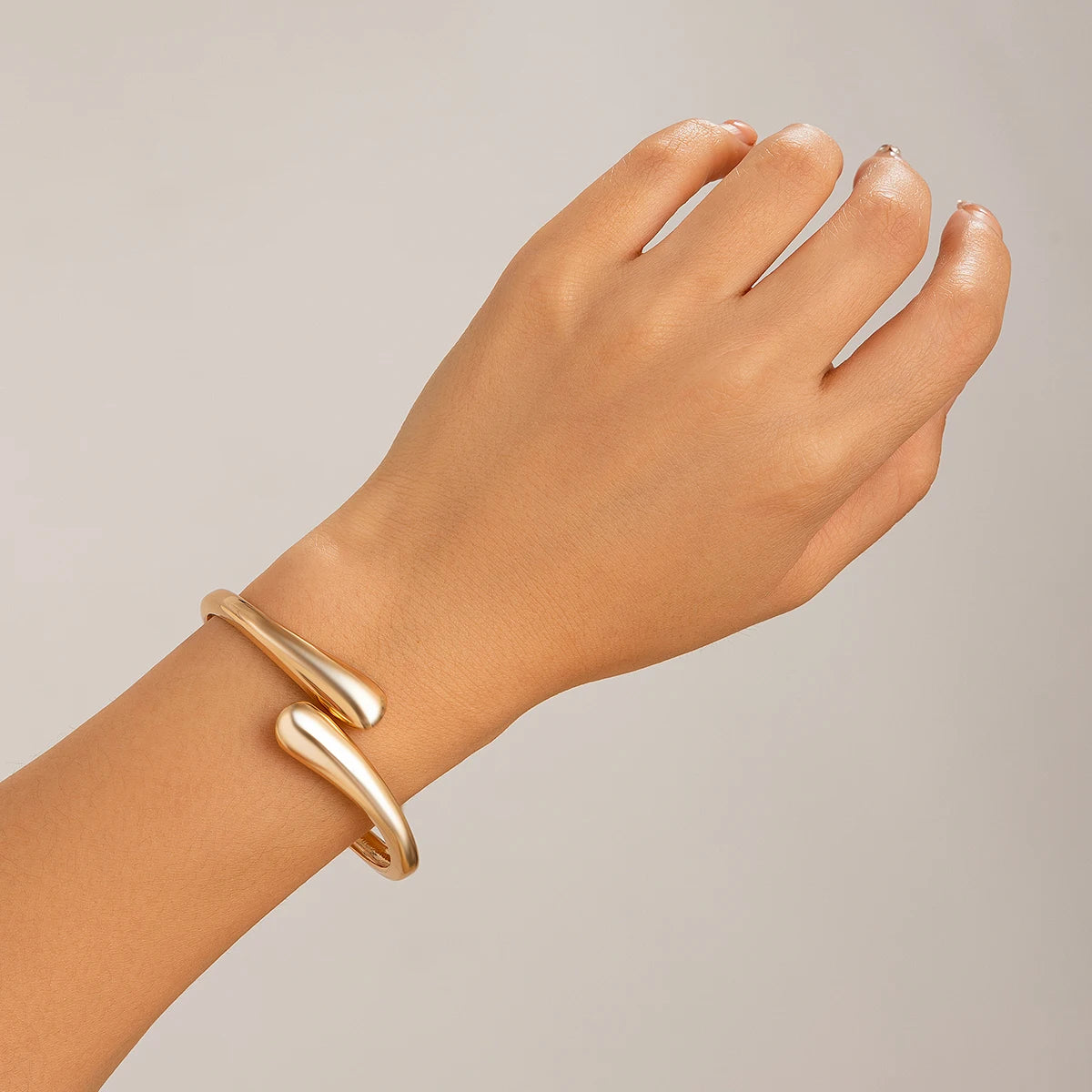 Ingemark Creative Gold Color Water Drop Wide Metal Bangle