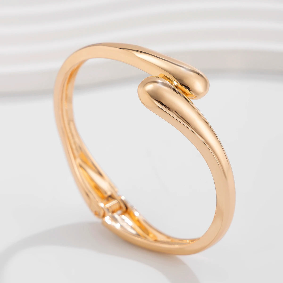 Ingemark Creative Gold Color Water Drop Wide Metal Bangle